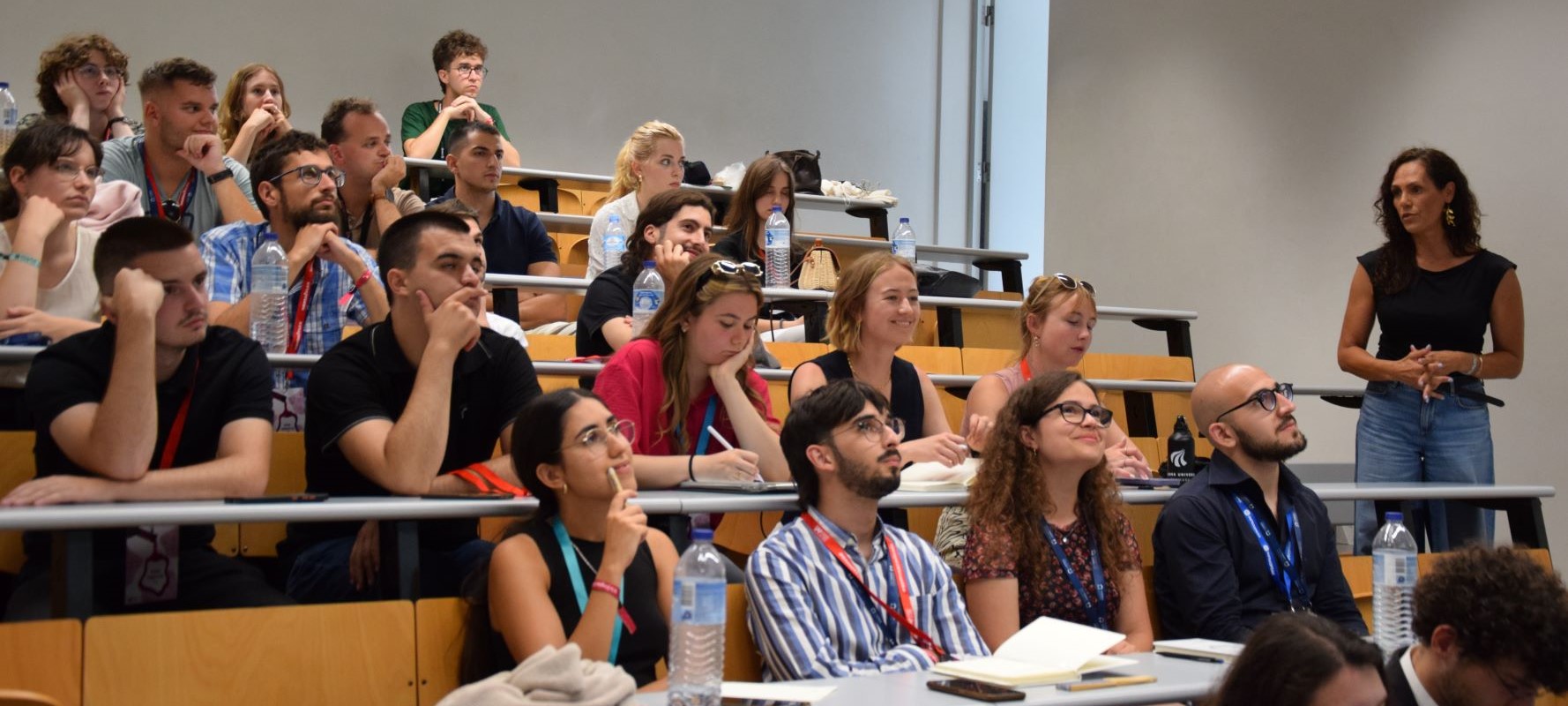 People in a classroom hearing a lecture